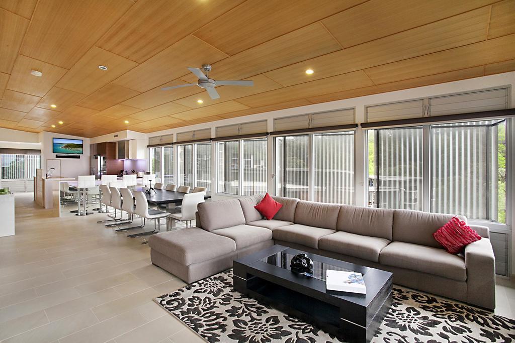 Peppers Noosa Resort And Villas Екстериор снимка A living room with a large sectional sofa